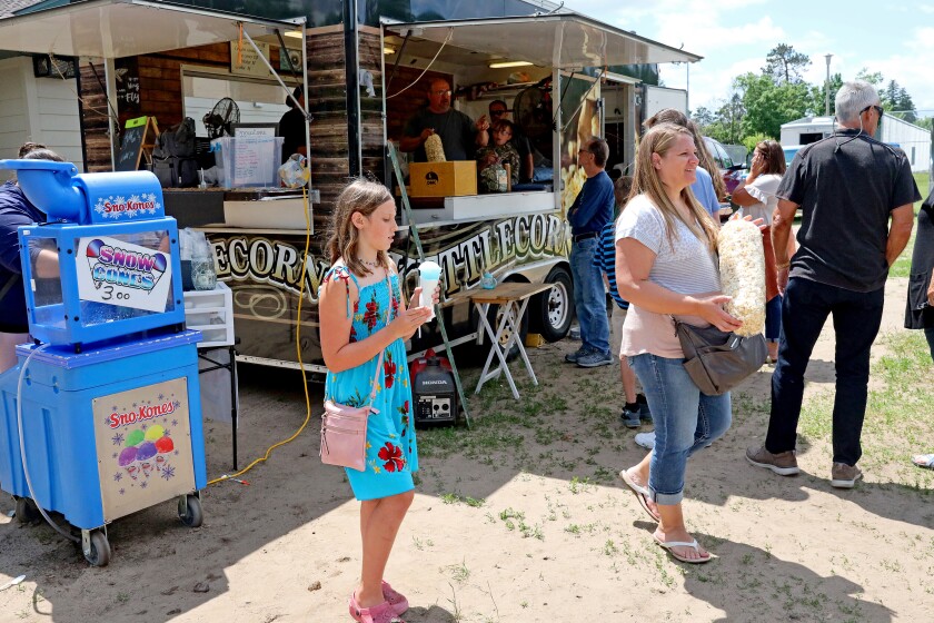 People attend Arts in the Park on Sunday, June 26, 2022, at Gregory Park in Brainerd.