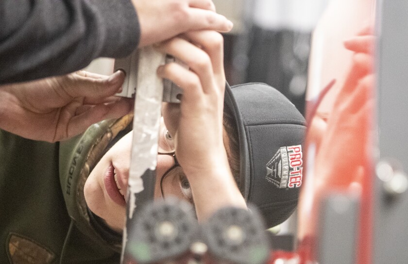 Wyatt Larson, a sophomore at Willmar High School, works to complete a robot during an afterschool gathering on Wednesday, Feb. 23, 2022. The team will be hosting this Saturday's FIRST Robotics Week Zero event at Willmar High School beginning at 9 a.m.