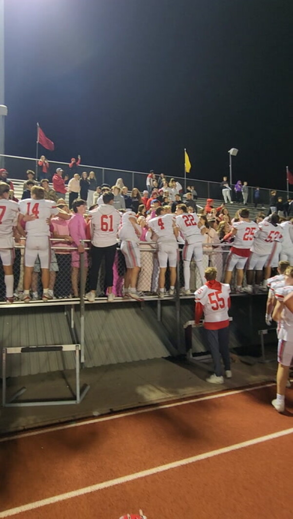 The Fargo Shanley football team celebrates with the Deacons student ...
