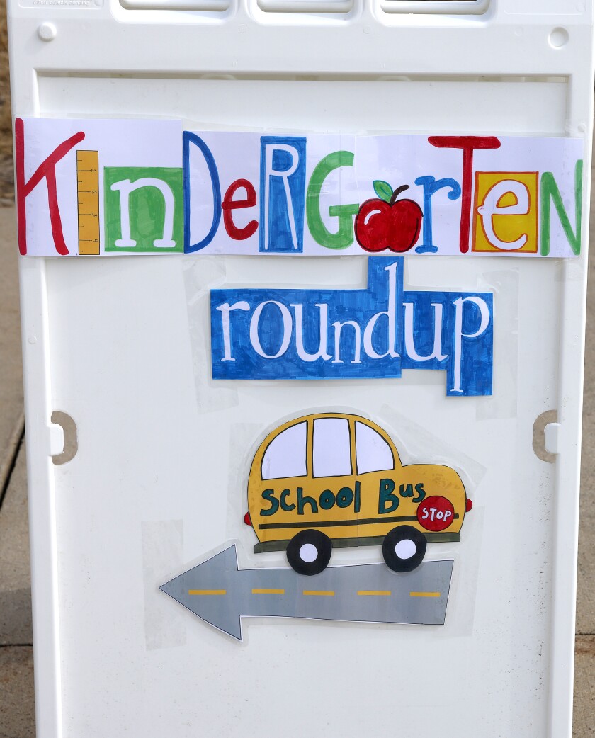 A sign points the way to Kindergarten Round-Up at Prairie Elementary in Worthington Monday morning.