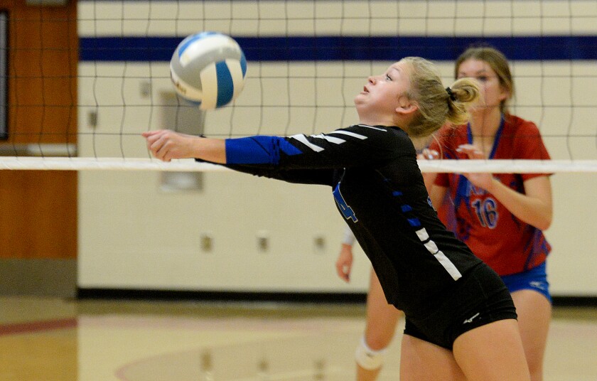 CMCS senior Ava Schneiderman reaches out to save the ball during a Camden Conference match against KMS on Thursday, Sept. 29, 2022 in Kerkhoven.