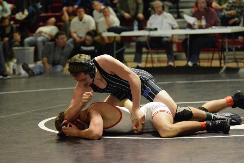 The Road Crew's Nick Gravdahl, top, won the 160-pound title at the Mid-State/Heart 'O Lakes Conference wrestling meet on Friday and Saturday, Jan. 23-24. Submitted photo