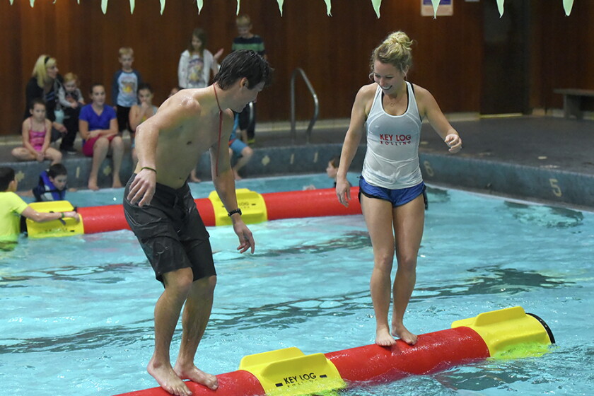 Log Roll Pool Rider (VIDEO) Rolling right along: Champion log rollers bring sport ...