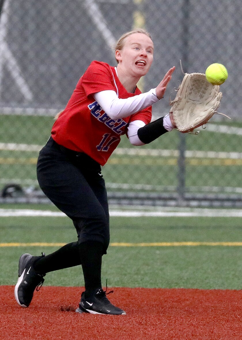 Moose Lake’s Lily Kahara (11) makes a catch in the outfield