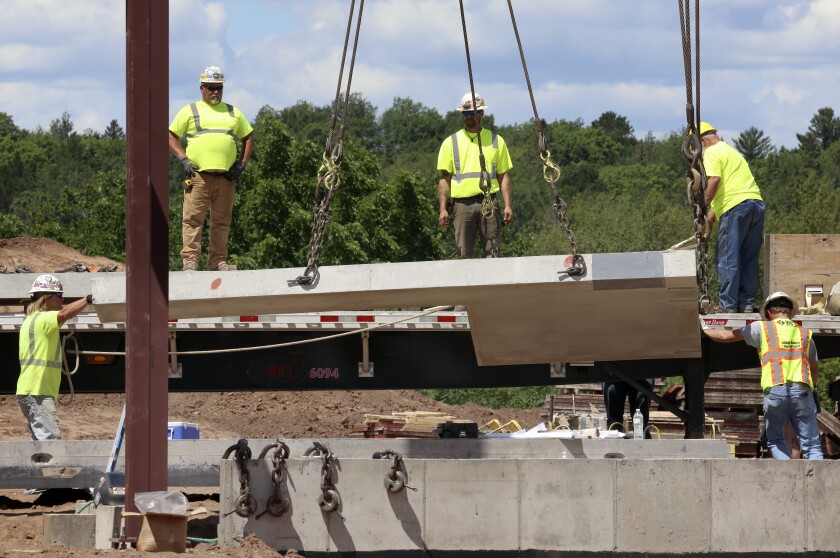 Moving a wall panel.