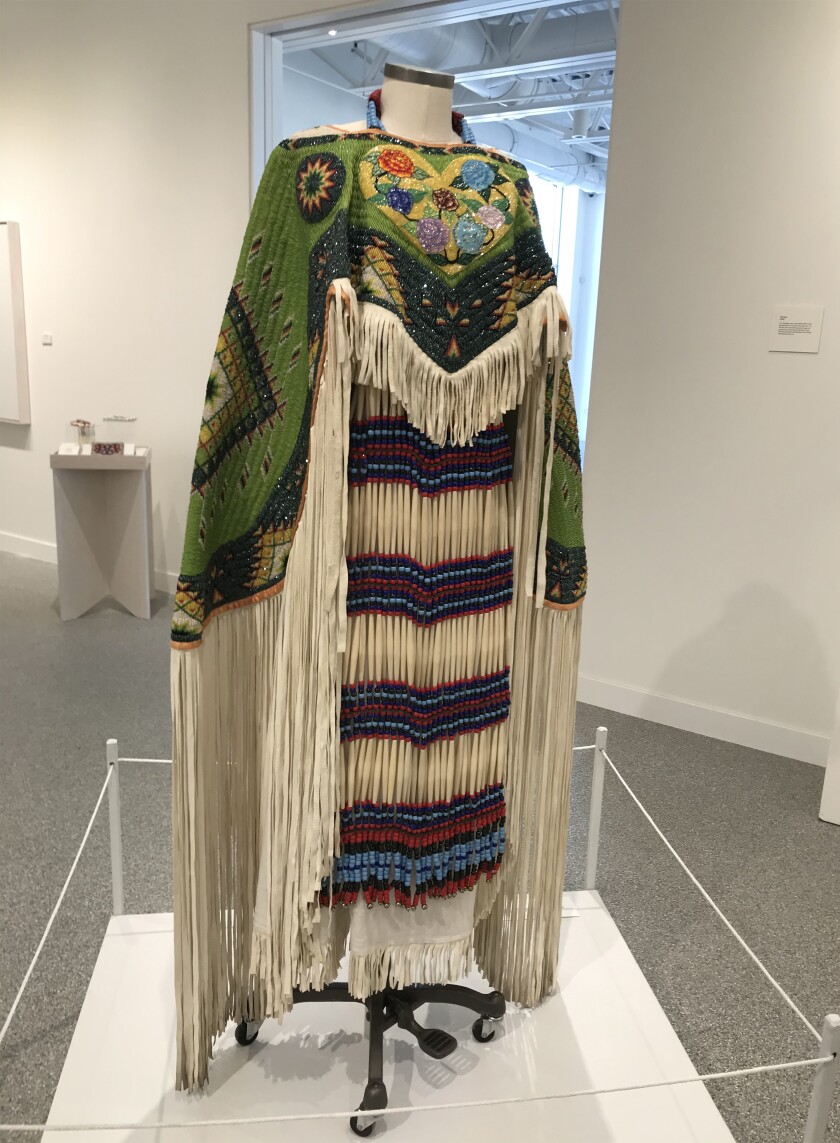 Traditional beaded buckskin cape dress.jpg