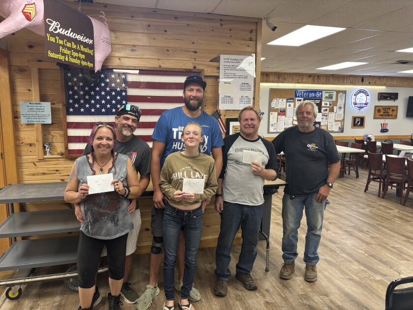 cornhole winners.jpeg