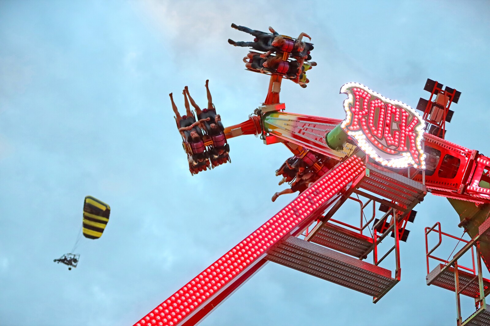 People enjoy the Crow Wing County Fair midway.
