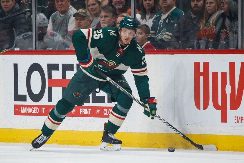 Minnesota Wild defenseman Jonas Brodin (25) skates with the puck in the first period against the Tampa Bay Lightning at Xcel Energy Center in St. Paul on Jan. 20, 2018. Brad Rempel / USA TODAY Sports
