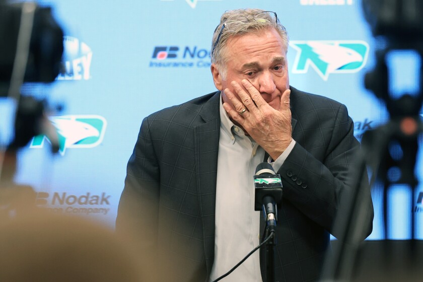 UND honors football coach Bubba Schweigert as he steps down