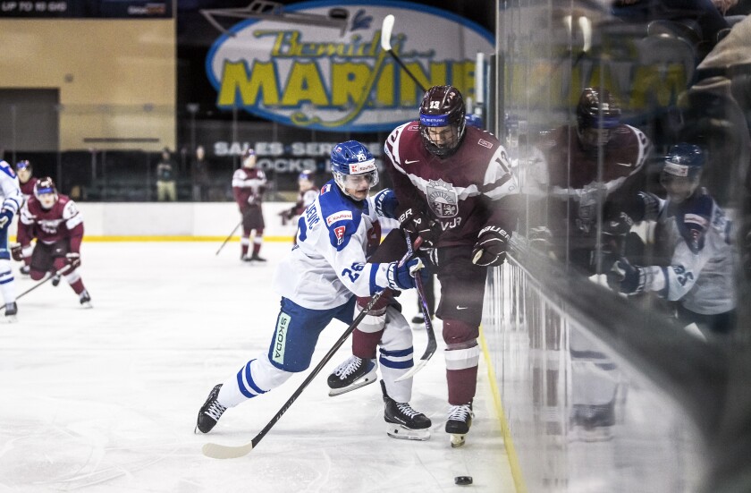 122425.S.BP.WORLDJUNIORS - Luka Radivojevic and Martins Klaucans.jpg