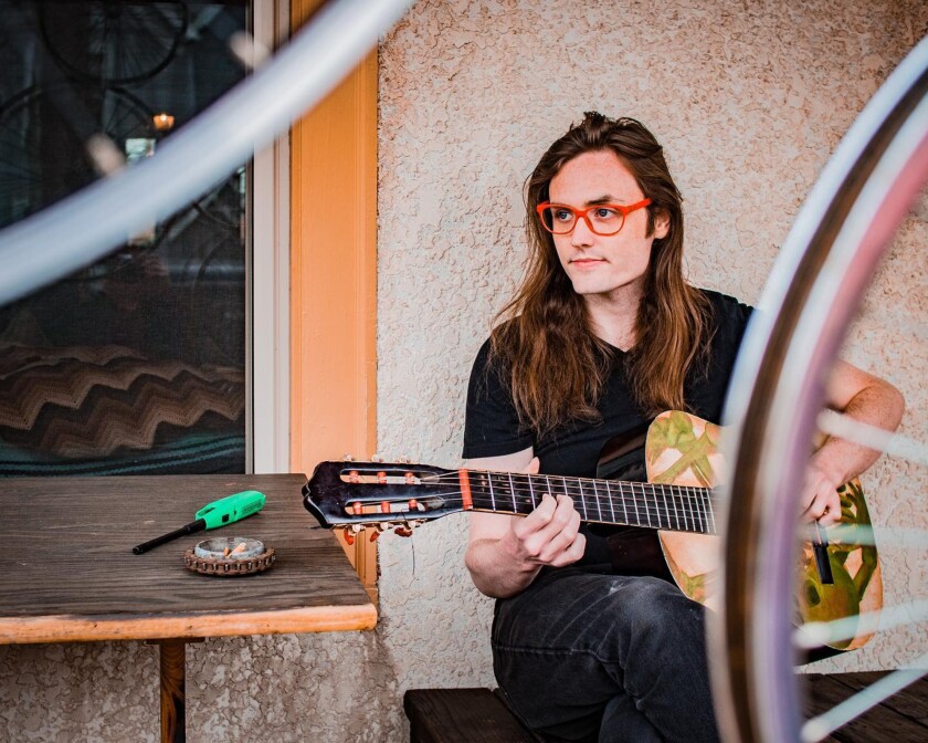 themselves play on an outdoor patio.