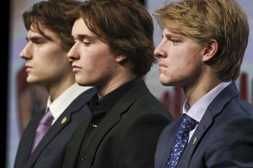 BU rookie Macklin Celebrini grabs Hobey Baker Award, but will he stay