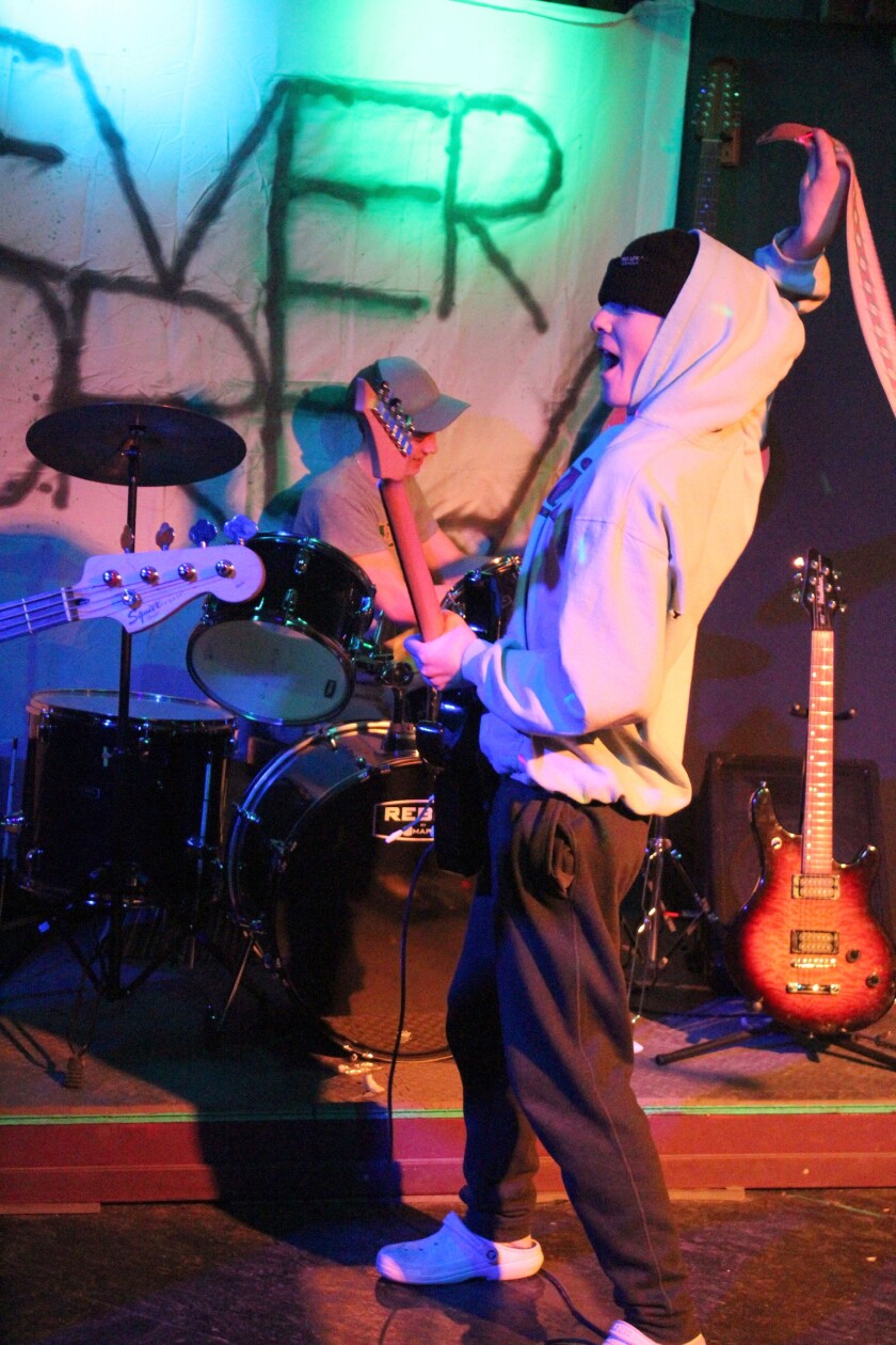 012622.N.PRE.CheeringGuitarist.jpg