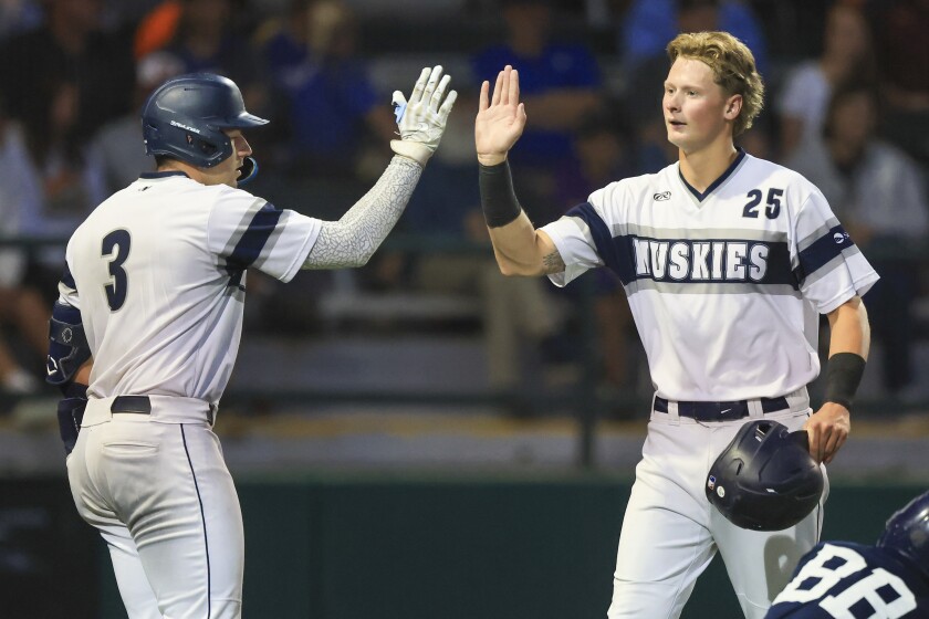 college men play baseball