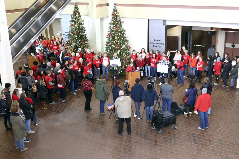 People gathered for a news conference.