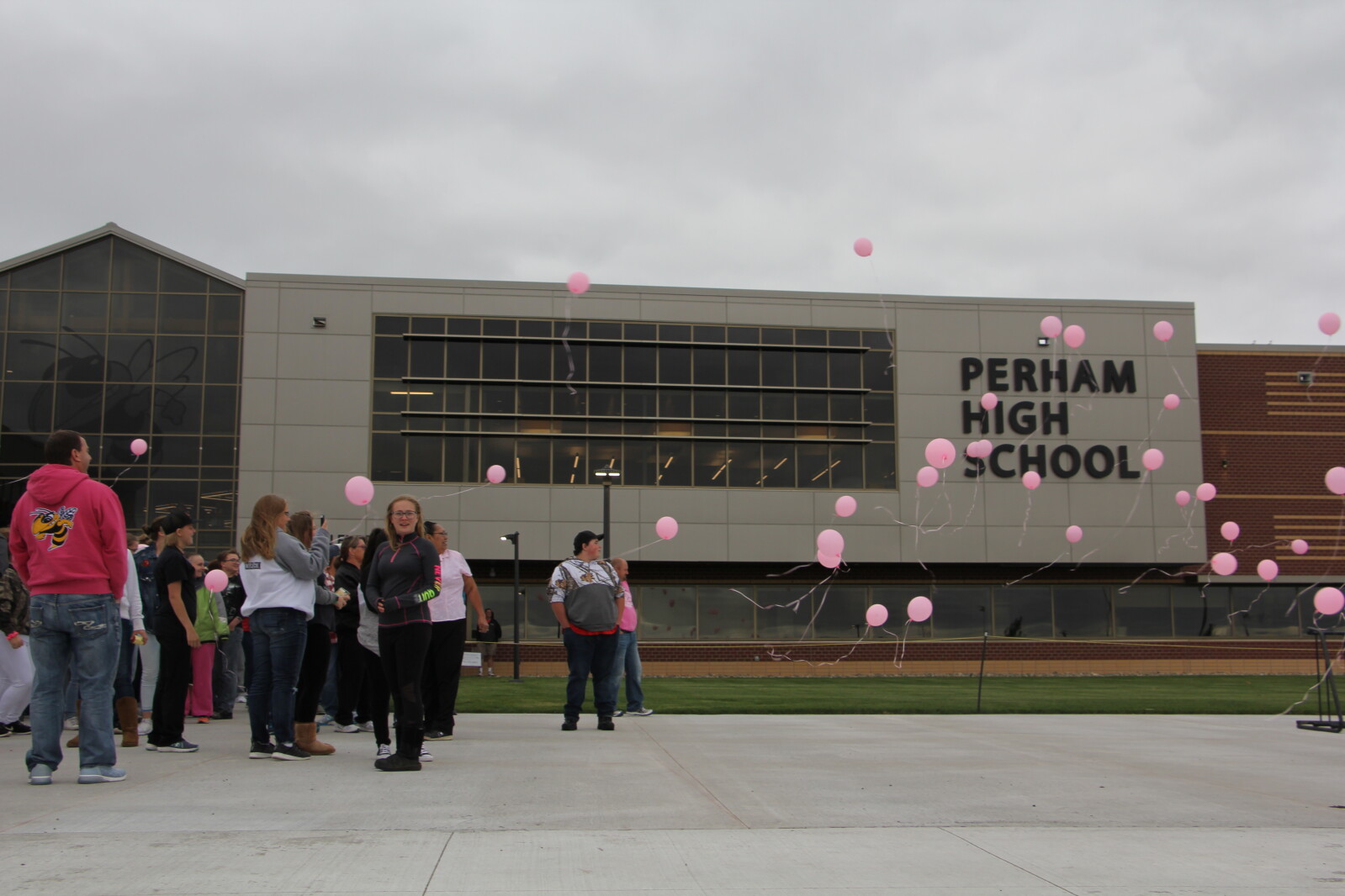 Perham High School students, staff release balloons in honor of cook