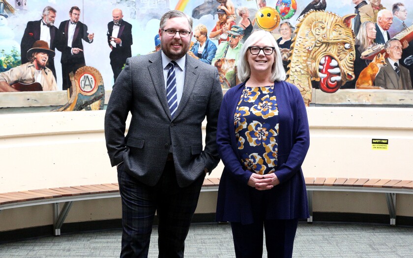 Duluth Superior Symphony Orchestra Executive Director Brandon VanWaeyenberghe and Minnesota Ballet Executive Director Maude Dornfeld smiling