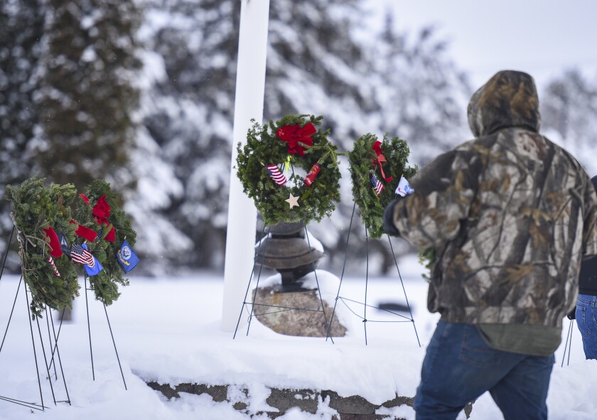 122122.N.BP.WREATHLAYING 4.jpg