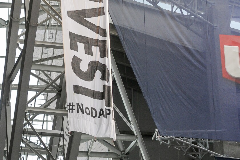 Protesters Rappel From Rafters During Vikings Bears Game West Central protesters-rappel-from-rafters-during-vikings-bears-game-west-central