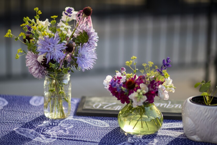 Colorful flowers for sale on baby blue truck