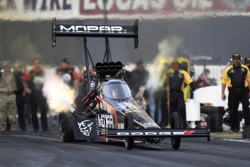 Leah Pritchett and her Mopar Dodge dragster speed down the dragstrip earlier this year. Pritchett will be defending her Top Fuel champion at the NHRA Lucas Oil Nationals Aug. 17-19 at Brainerd International Raceway. NHRA Photo