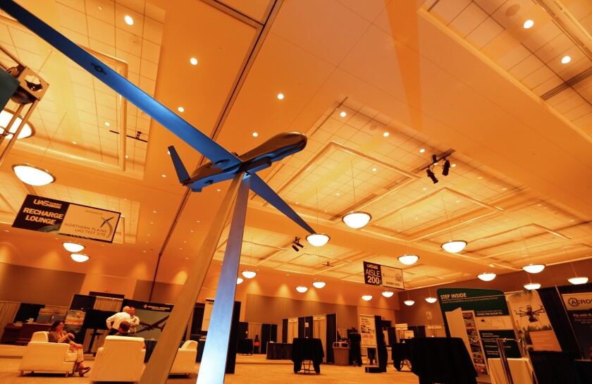 A Global Hawk display greets UAS expo-goers at the Alerus Center in Grand Forks. (Joshua Komer/Grand Forks Herald)