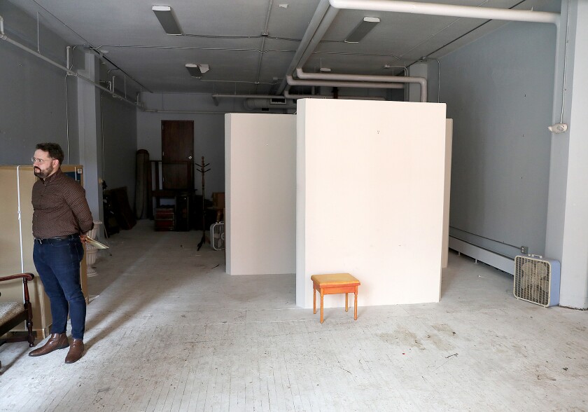 Man talks in new space.