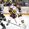 college men play ice hockey