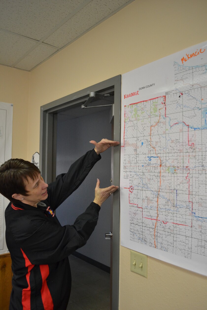 Killdeer Area Ambulance paramedic manager Ann Hafner shows what region the service covers