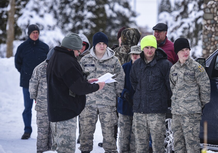 122122.N.BP.WREATHLAYING 5.jpg