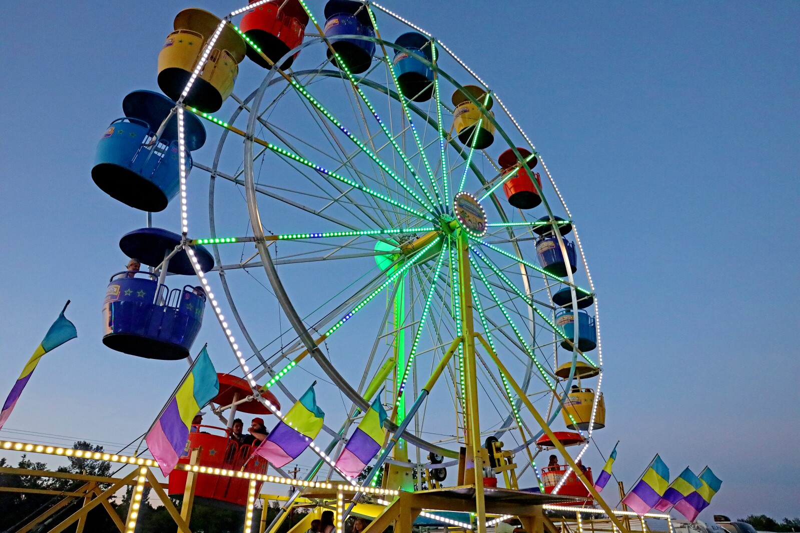 People enjoy the Crow Wing County Fair midway.