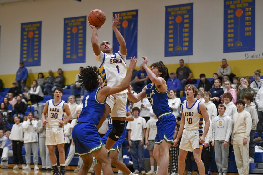 Boys playing basketball
