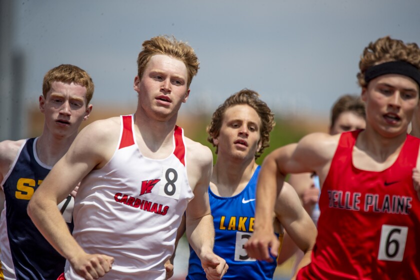 Colin O'Farrell of Willmar, second from left, sticks with the pack while competing in the boys 800-meter run during the Class AA state track and field championships at St. Michael on Saturday, June 11, 2022.