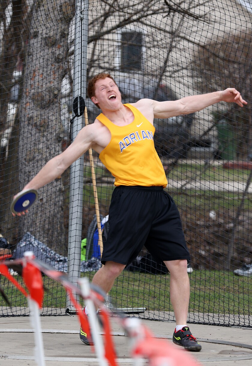 Adrian-Ellsworth Cole Boltjes let's lose of the discus for a personal record throw during the Worthington Trojans Invite Thursday afternoon.