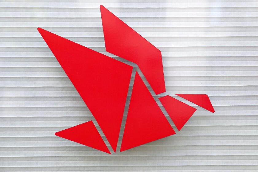 red bird logo on window