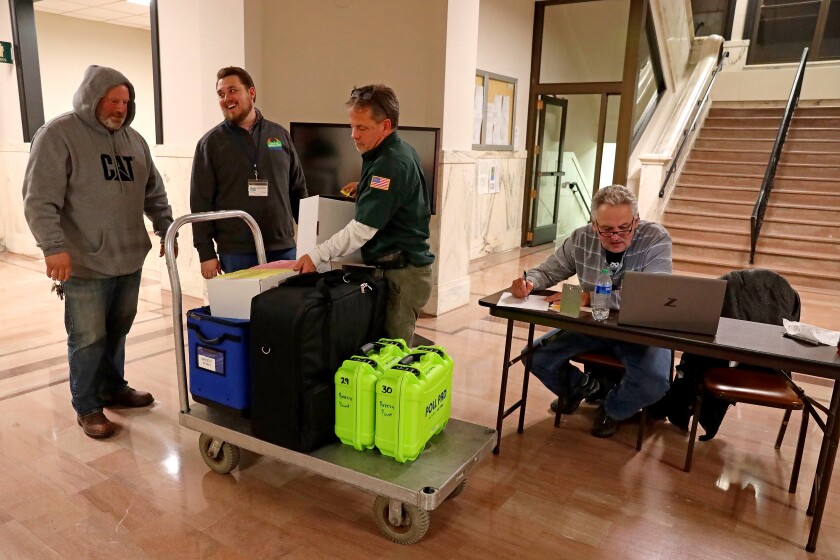 Breezy Point precinct rolls their results in on election night Tuesday, Nov. 8, 2022, at the Crow Wing County Historic Courthouse in Brainerd.