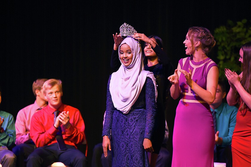 Briana Sanchez / TribuneAnisa Abdulahi is crowned homecoming queen at Willmar Senior High School Monday night. Abdulahi and Christian Grant Duininck were named homecoming queen and king.