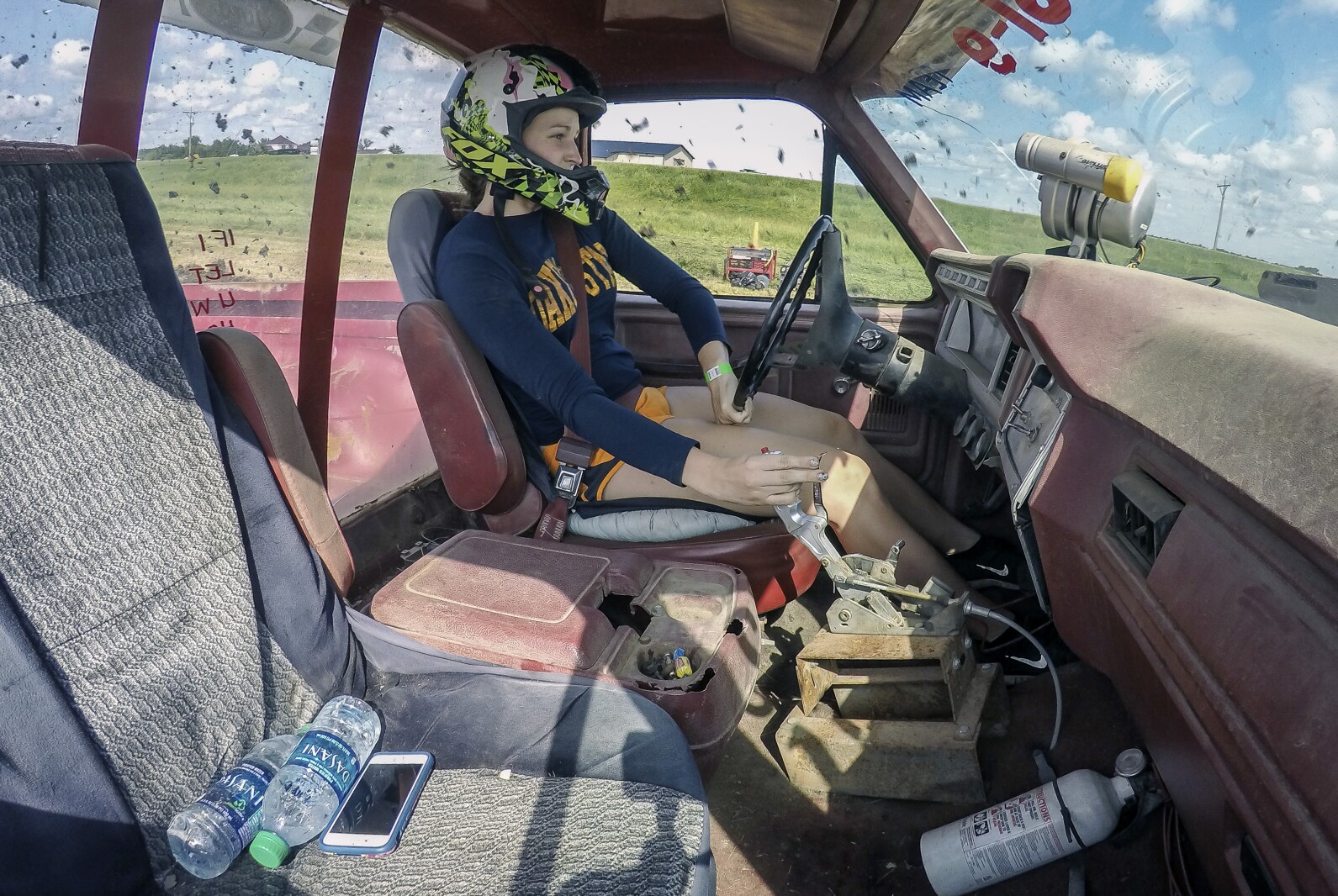 Beating the guys: Rare female mud racer climbs the ranks