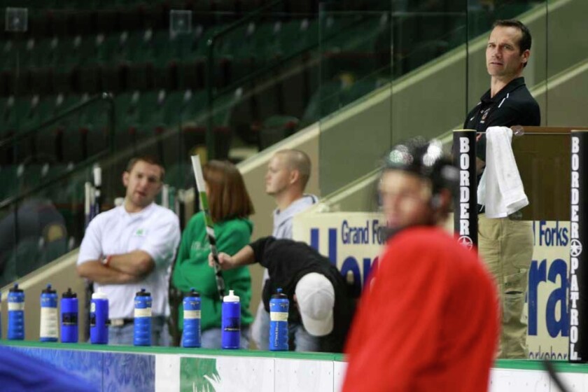 MEN'S HOCKEY: Poolman treats them like his own - Grand Forks Herald ...