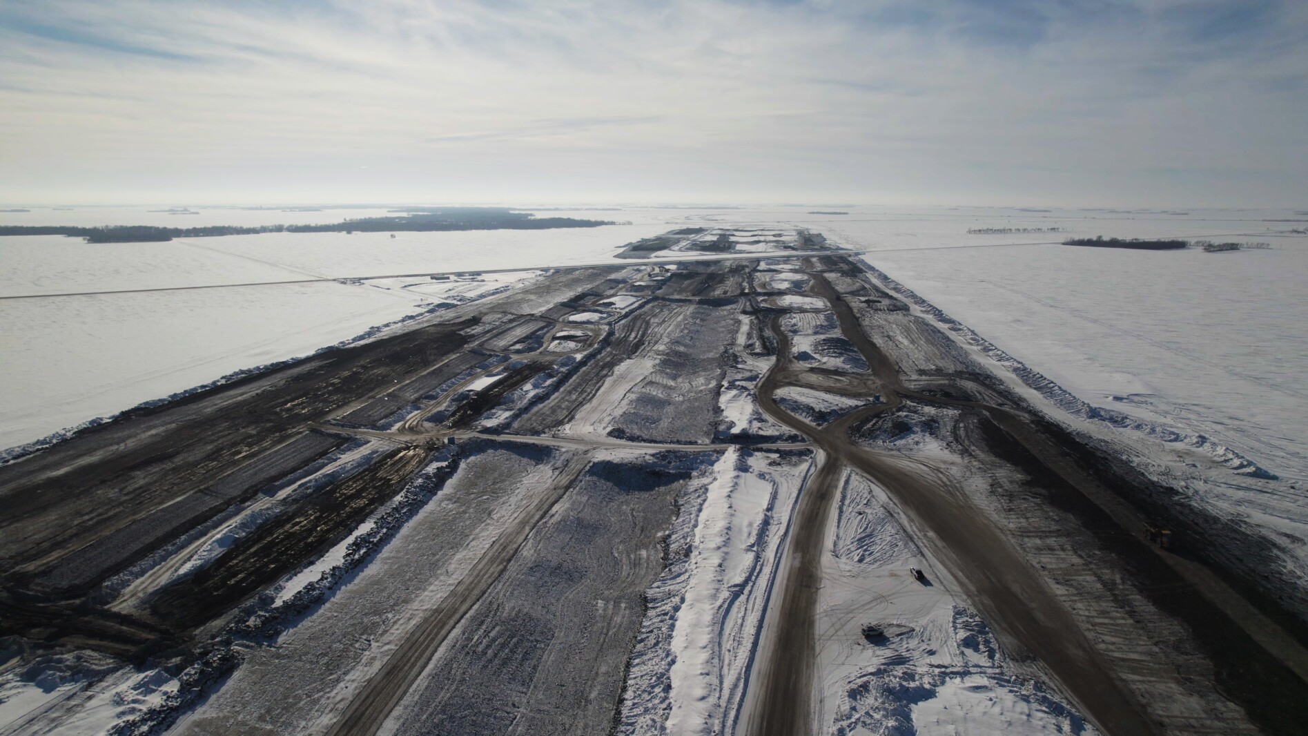 Construction continues around the clock on the big dig as workers build ...
