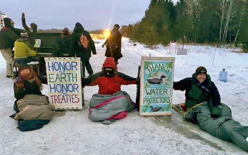 020421.N.PRE.EightProtesters.jpg
