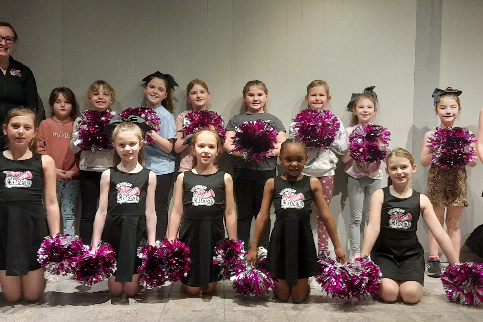Cheer Program Mini cheers and bigger smiles at new cheerleading program for ...