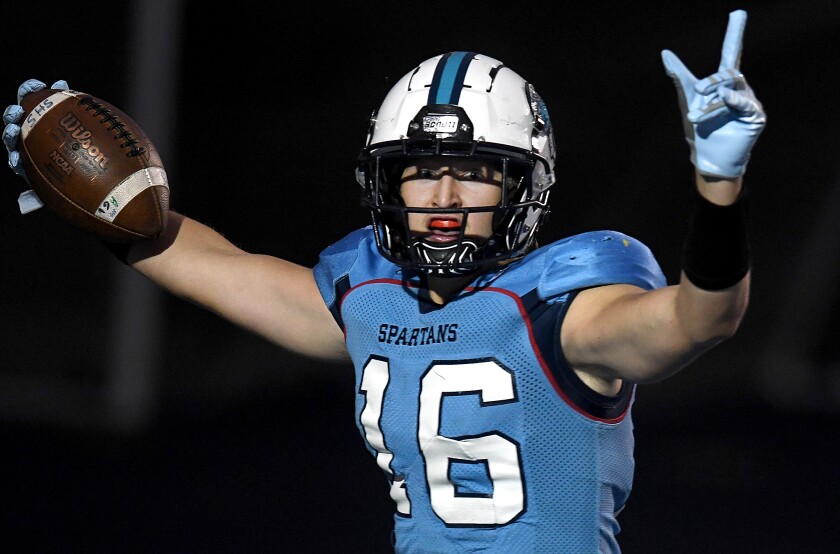 Superior’s Lucas Williams (16) celebrates a first quarter touchdown