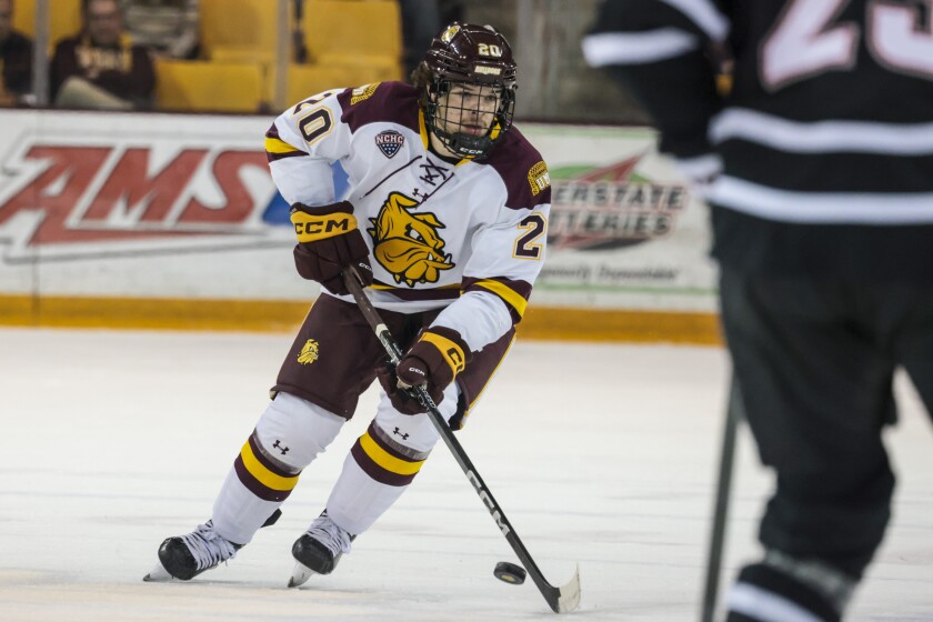 college men playing hockey