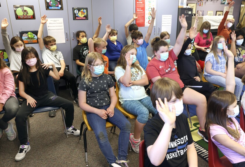 Gaelynn Lea performs a song for students at Cloquet’s Churchill Elementary School.