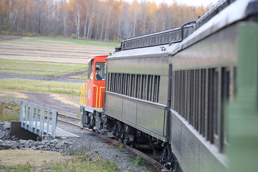 Train goes over bridge.