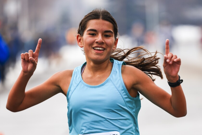 people running road race in Thankgiving themed clothing