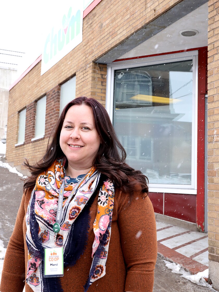 Marci Strack, of Whole Foods Co-op, stands outside of CHUM in Duluth