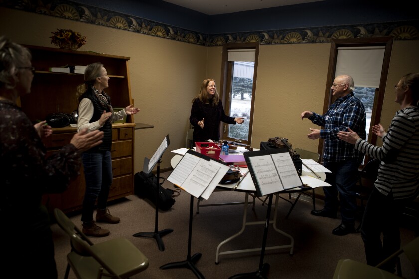 Instructor Cristina Seaborn has participants clap on the off beat while practicing at Hope Lutheran Church in Sunburg during the free fiddle workshop on Sunday, April 3, 2022.